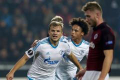 Schalke 04's Geis celebrates with his teammate Sane after scoring a goal against Sparta Prague during their Europa League soccer match in Prague