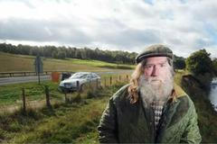 bezdomovec u skotské dálnice