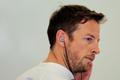 McLaren Formula One driver Jenson Button of Britain looks on during the first practice session of the Bahrain F1 Grand Prix at the Bahrain International Circuit (BIC) in Sakhir