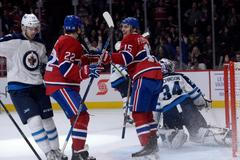 Tomáš Fleischmann z Montrealu se raduje v NHL z branky proti Winnipegu