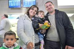 Desítka křesťanských uprchlíků z Iráku přiletěla do Prahy