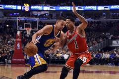Stephen Curry a Derrick Rose