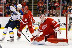 Dmitrij Jaškin a Jimmy Howard