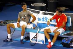 Stan Wawrinka a Novak Djokovič při tréninku na Australian Open 2016