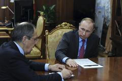 Russian President Putin meets Foreign Minister Lavrov at the Kremlin in Moscow