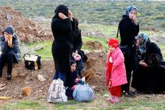 Syrští uprchlíci v Turecku, kterým bezpečnostní složky zabránili v nalodění se na člun do Řecka.