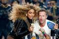 Beyonce and Chris Martin of Coldplay perform during the half-time show at the NFL's Super Bowl 50 between the Carolina Panthers and the Denver Broncos in Santa Clara