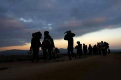 Běženci na cestě do Makedonie. Miratovac, Srbsko.