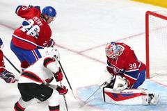 NHL, New Jersey - Montreal: Jiří Tlustý (9) - Jeff Petry (26) a Mike Condon (39)