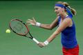Czech Republic's Petra Kvitova returns a ball to Germany's Andrea Petkovic during their final match of the Fed Cup tennis tournament in Prague
