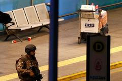 Armed security walks at Turkey's largest airport, Istanbul Ataturk
