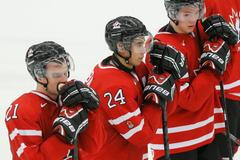 Canada's Laughton, Dumba and Lazar react after their loss to the Czech Republic in their IIHF World Junior Championship ice hockey game in Malmo
