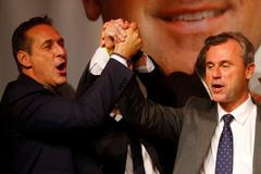 Presidential candidate Hofer of the Austrian Freedom Party (FPOe) and party head Strache sing a song during party celebrations after Austrian presidential election in Vienna