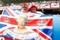 Británie Anglie Euro 2016 England fans hold up a flag displaying Britain's Queen Elizabeth before the game