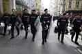 Riot police secure the area as representatives of foreign missions march in Istiklal street during a protest against Saturday's suicide bombing, in central Istanbul