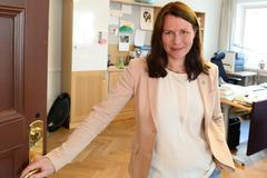 Sweden's Green Party joint head of party and deputy PM Asa Romson smiles during an interview following the announcement of her resignation in Stockholm