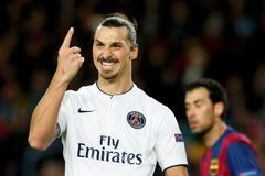 Paris St Germain's Zlatan Ibrahimovic gestures during their Champions League Group F soccer match against Barcelona at the Nou Camp stadium in Barcelona
