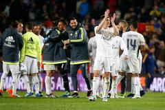 Real Madrid's Toni Kroos and teammates celebrate after the match