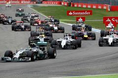 Mercedes Formula One driver Rosberg leads the race in the first corner after the start of the German F1 Grand Prix at the Hockenheim racing circuit