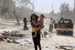 Severosyrské Aleppo po bombardování barelovými bombami