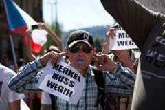 Shromáždění při příjezdu Angely Merkelové do Prahy