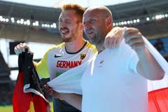 OH 2016, atletika-sedmiboj, hod diskem: zlatý Christoph Harting (GER) a stříbrný Piotr Malachowski (POL)