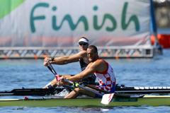 OH 2126, veslování-skif, finále: Mahe Drysdale (NZL) a  Damir Martin (CRO)