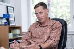 Martin rozumek, šéf Organizace pro pomoc uprchlíkům