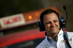 Williams Formula One driver Massa of Brazil reacts during the first testing session ahead of the upcoming season at the Circuit de Barcelona-Catalunya in Montmelo
