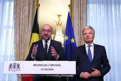 Belgický premiér Charles Michel a belgický ministr zahraničí Didier Reynders