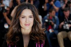 Producer Salma Hayek poses during a photocall for "Tribute to animated films", a special screening of extracts from Khalil Gibran's The Prophet out of competition at the 67th Cannes Film Fes