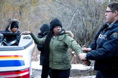 Lidé, kteří se snaží dostat přes americko-kanadské hranice.