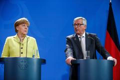 Merkelová a Juncker