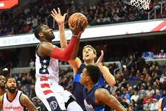 John Wall, Yogi Ferrell a Dirk Nowitzki