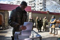 Povstalecký velitel Givi na snímku z roku 2014.