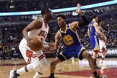 NBA: Golden State Warriors vs. Chicago Bulls (Dwyane Wade (3), Patrick McCaw)