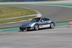 Splněný sen zájemce o testování všech vozů Porsche. Střídali jsme auta na dráze, na vodě a v terénu