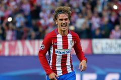Antoine Griezmann z Atlétika slaví gól v síti Realu