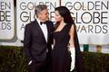 George and Amal Clooney arrive at the 72nd Golden Globe Awards in Beverly Hills