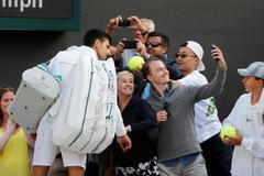 Poslední selfie. Berdychova cesta do semifinále vedla přes Djokovičův bolavý loket