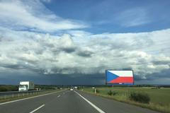 billboard dálnice D4 vlajka