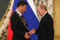 Si Ťin-pching na návštěvě Vladimira Putina v Moskvě.