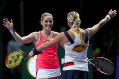 Andrea Hlaváčková s Maďarkou Tímeou Babosovou.