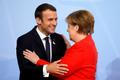 Angela Merkelová a Emmanuel Macron na summitu G20 v Hamburku.