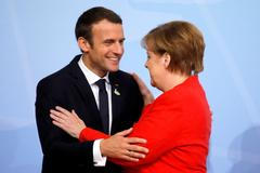 Angela Merkelová a Emmanuel Macron na summitu G20 v Hamburku.