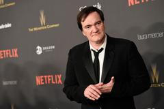 Quentin Tarantino na Weinsteinově afterparty po vyhlašování Zlatých glóbů v lednu 2016.