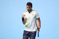 Grigor Dimitrov slaví na Turnaji mistrů vítězství nad Davidem Goffinem