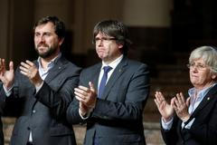 Bývalý katalánský premiér Carles Puigdemont na setkání se starosty v Bruselu