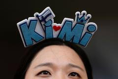 Fanynka Kimiho Räikkönena při Velké ceně Malajsie 2017