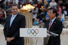 Předávání olympijského ohně do rukou Jihokorejcům